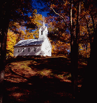 Tennessee Baptist church surrounded by fall trees